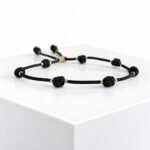 Pulsera DE LA SUERTE ACERO ORO Negro